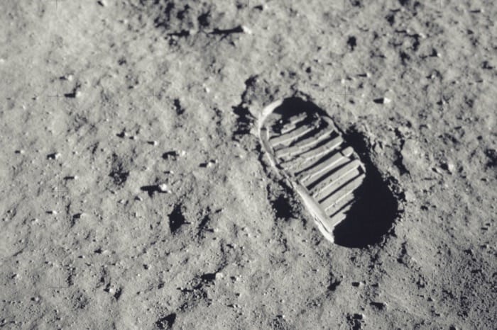 Neil Armstrong steps on the Moon